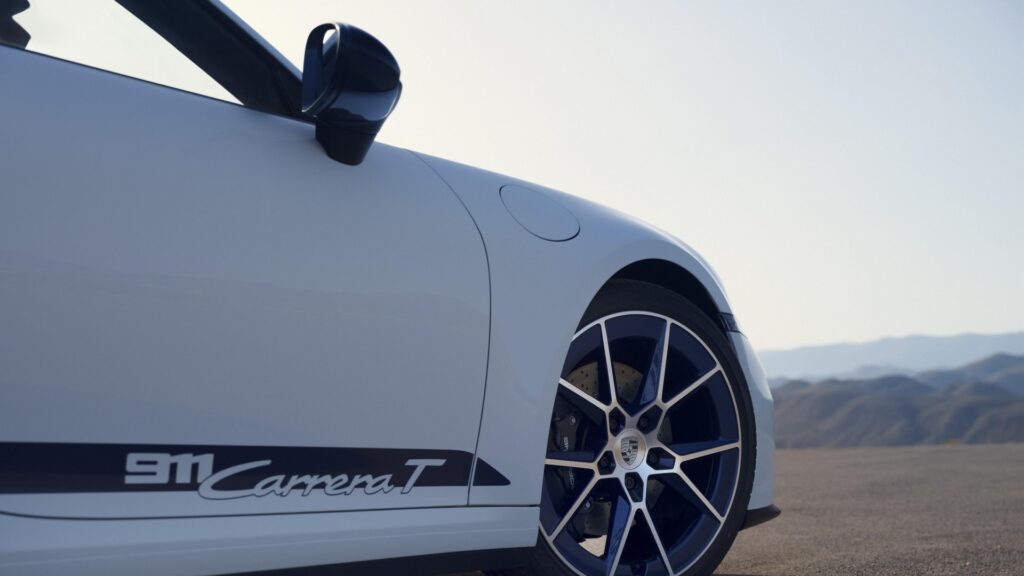 2025 Porsche 911 Carrera T, front wheel and badging. Image courtesy of Porsche