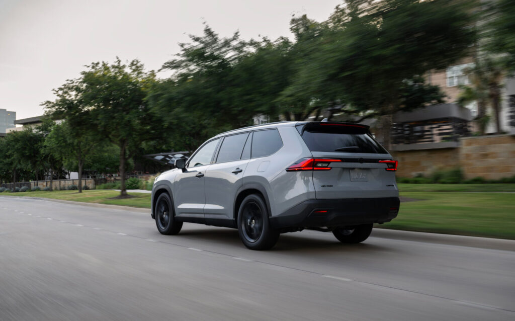 2025 Toyota Grand Highlander Nightshade Edition, rear 3/4 action. Image courtesy of Toyota