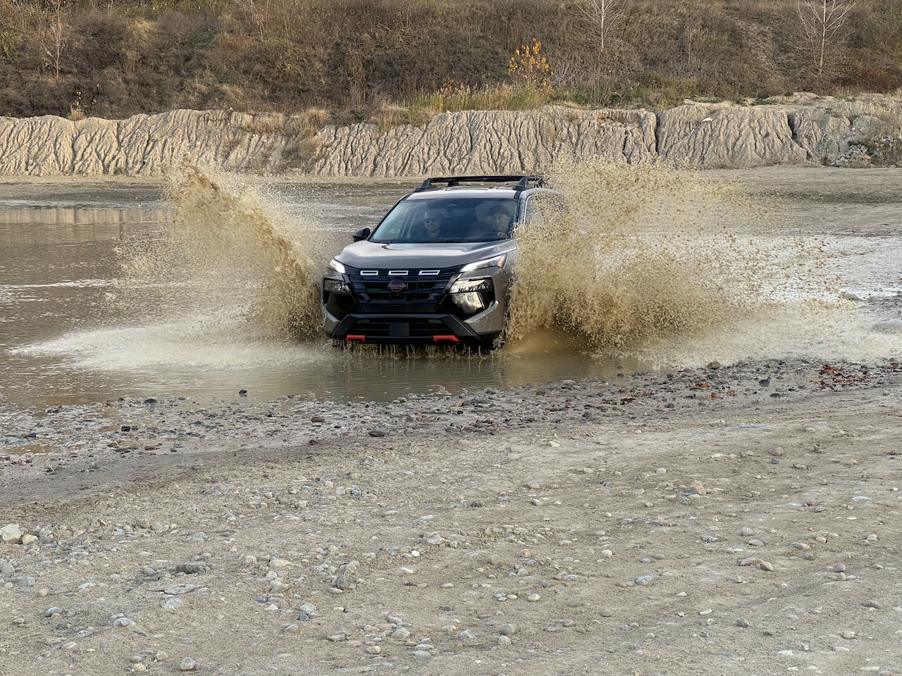 2025 Nissan Rogue Rock Creek, front 3/4 in action. Image by Robin Warner